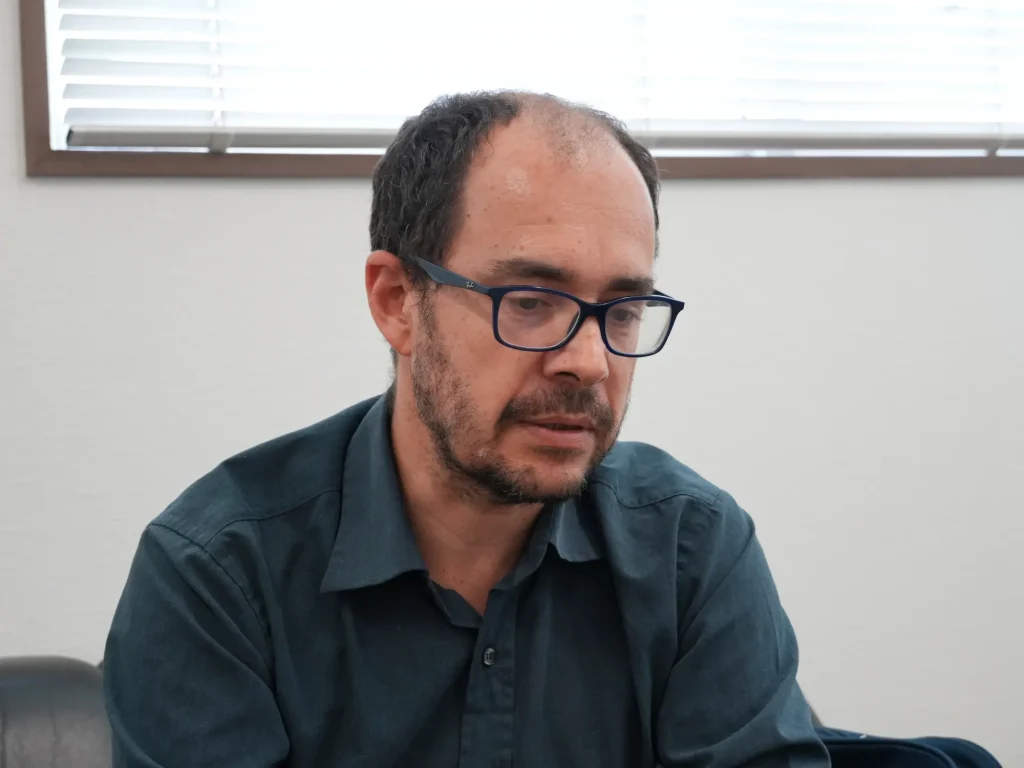 Dr. Johann speaking on his personal history