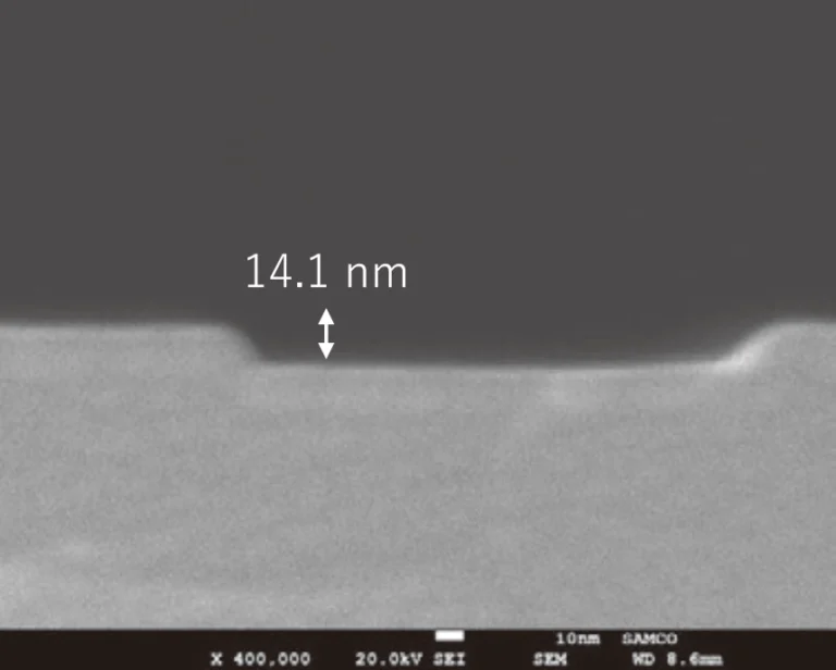 Figure 3. SEM image of GaN/AlGaN ALE-etched trenches with (b) 200 nm Trench Width