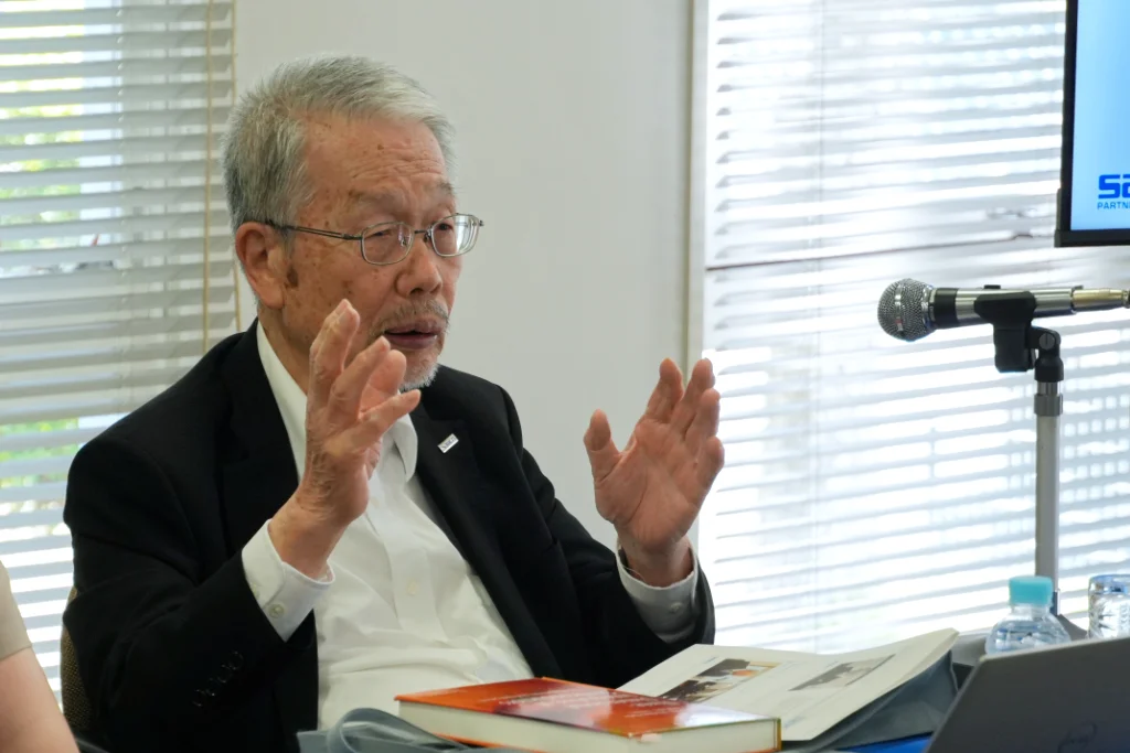 Samco Founder and CEO Dr. Osamu Tsuji discussing founding philosophies of Samco during his lecture for the University of Central Arkansas (UCA) students visiting the company.