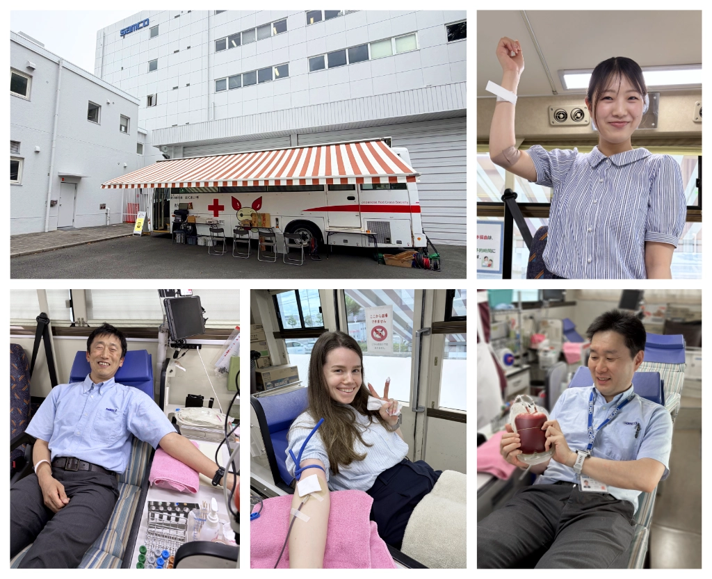 Mobile Blood Donation Van and several employees donating blood