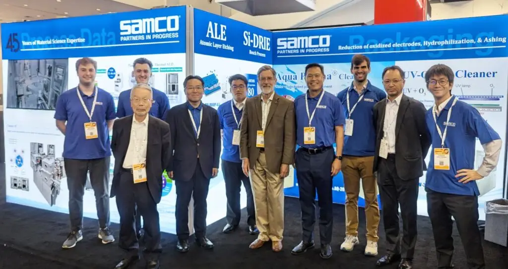 Samco Inc's team photo at SEMICON West 2024, in front of their booth